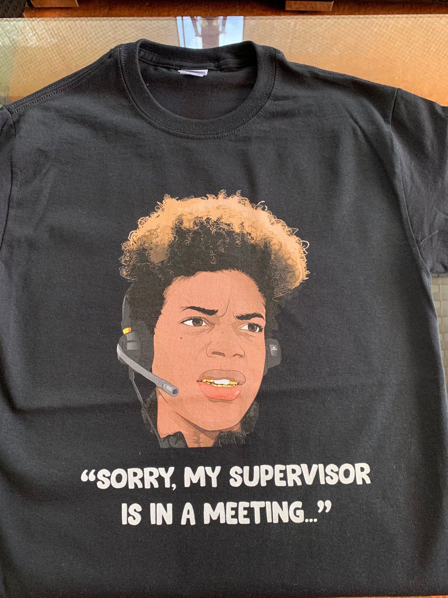 Funny Customer Service Shirt. "Sorry, my supervisor is in a meeting."